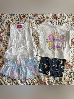 Girls mixed lot featuring t-shirt, tank top, shorts and a skort